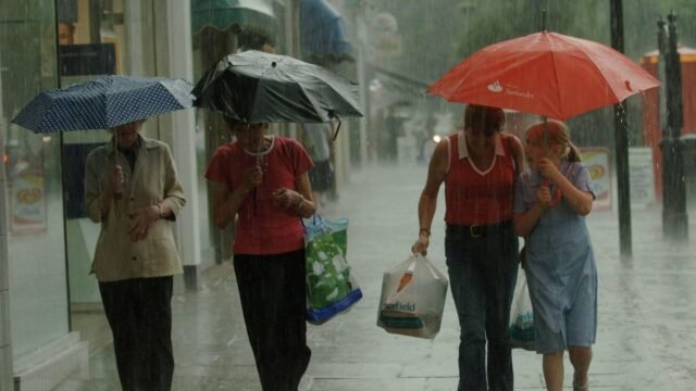 1780260543_1_People-under-umbrellas-in-rain-on-high-street.jpg