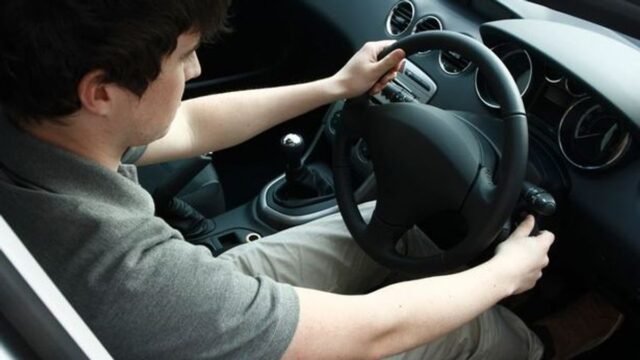 10_Young-Male-Driver-at-the-wheel-of-a-car.jpg