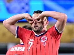 John McGinn ពន្យល់ពីហេតុផលដ៏គួរឱ្យចាប់អារម្មណ៍សម្រាប់ការប្រារព្ធពិធីកាន់វ៉ែនតាជិះស្គីរបស់គាត់នៅឯការប្រកួតជើងឯកពិភពលោក