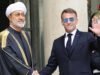 ហេតុអ្វីបានជា Emmanuel Macron ដកវ៉ែនតារបស់គាត់ចេញ ដើម្បីស្វាគមន៍ស្តេចស៊ុលតង់នៃប្រទេសអូម៉ង់