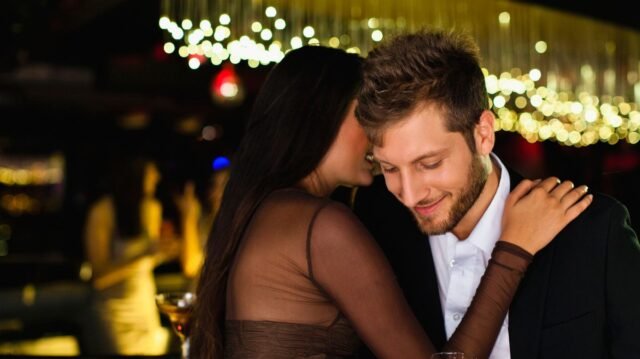 1782794396_2_Smiling-couple-whispering-at-barjpg.jpg