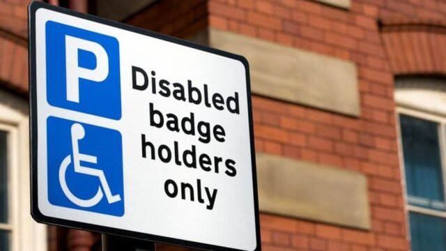 23_Disabled-Badge-Holders-Only-Sign.jpg
