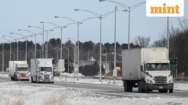 Trucks-drive-towards-the-Canada-US-border-in-Saint_1780373842652_1780373848638_e93ae14c-e79b-4dd5-b1.jpeg