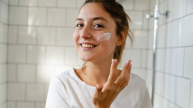 1783529153_0_Young-woman-taking-care-of-her-skin-with-a-skin-care-routine.jpg