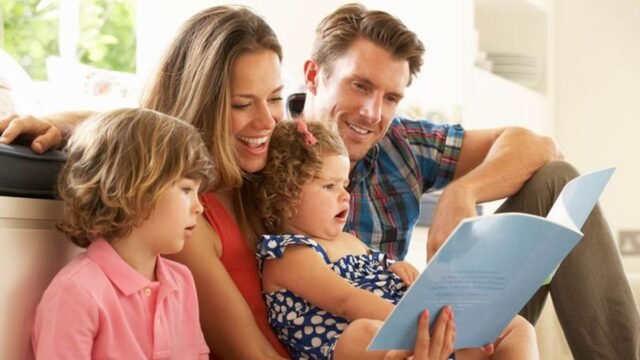 7_Parents-Sitting-With-Children-Reading-Story-Indoors.jpg